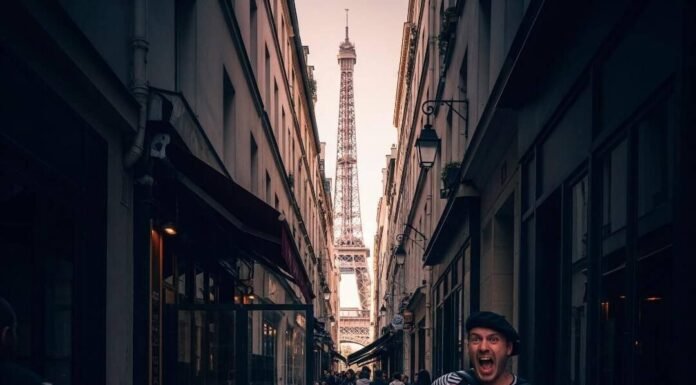 Safe Paris Areas Near Eiffel Tower & Top Attractions Eiffel Tower through alley, accordion player, café chairs.