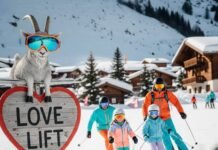 Family-Friendly Skiing Alps Resorts to Try A quirky ski scene with a goggle-wearing goat and a heart-shaped sign.