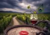 Burgundy vs Bordeaux: Which French Wine Tour Should You Choose? A wine glass and lipstick mark on a barrel.